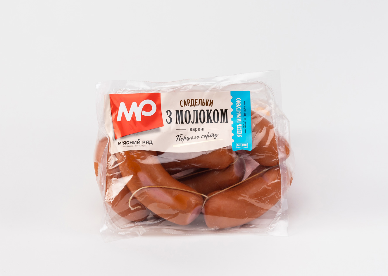 Сардельки з молоком варені